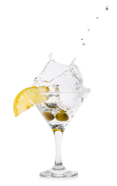 istock Martini splash with olives in a cocktail glass 1057152112