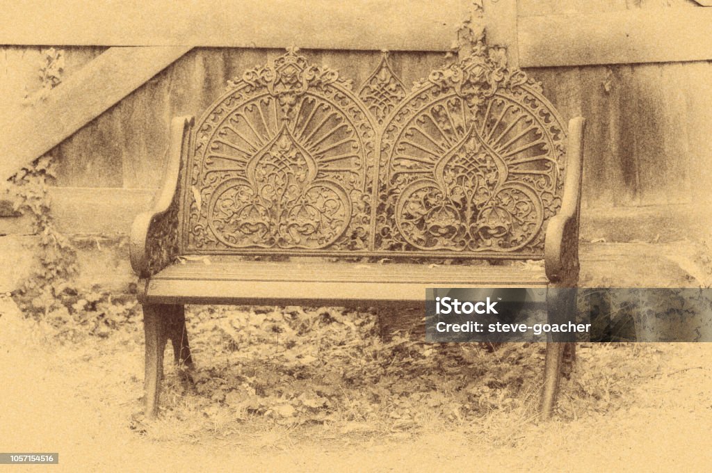 Old-fashioned garden chair featured in a calotype paper negative. A digitally produced image of an old-fashioned, metal garden chair depicted as a calotype paper negative. 19th Century Style Stock Photo