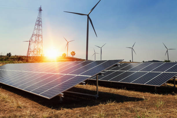 istock solar panel with wind turbine and sunlight. clean power energy concept 1057161220