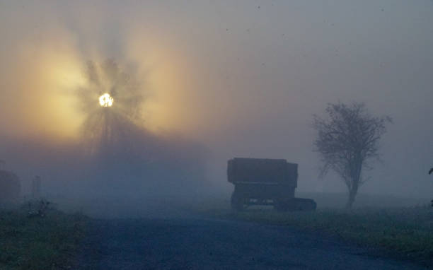 istock Sunrise in countryside with har fog 1057168216