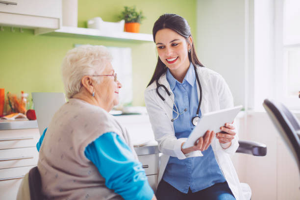 istock Doctor consulting her patient 1057168854