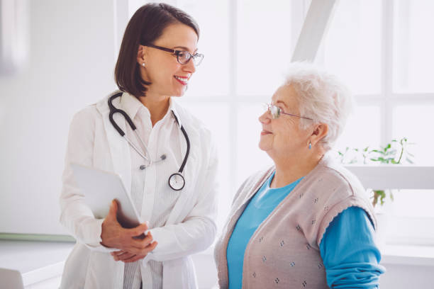 istock Doctor consulting her patient 1057170584