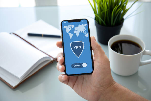istock hand holding phone vpn creation Internet protocols protection private network 1057171316