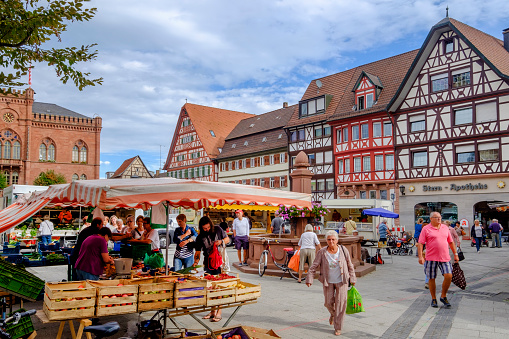 Market day in the historic centre of Tauberbischofsheim, one of the towns on the famous Romantic Road (Romantische Straße), the \