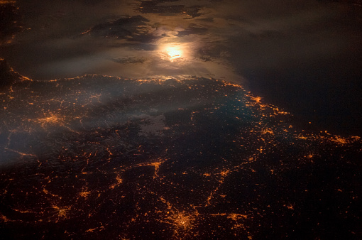 City lights at night along the France-Italy border. Satellite view. Elements of this image furnished by NASA.