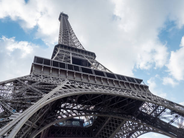 istock Looking Up to the Top of the Eiffel Tower From Under it 1057176860