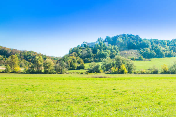 Croatia, countryside landscape, river Dobra and old fortress in Novigrad, Karlovac county