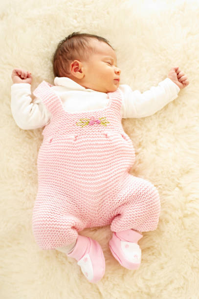 istock Three Weeks Old Baby Girl 1057178618