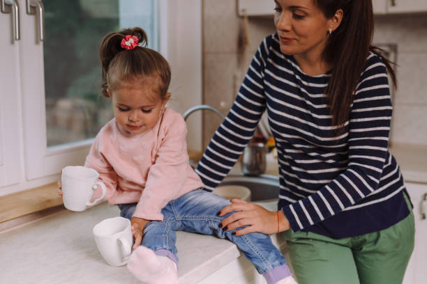 istock mother and daughter spending great time cooking in kitchen 1057180472
