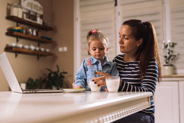 istock mother and daughter spending great time cooking in kitchen 1057180666