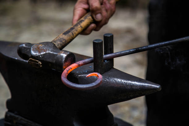 istock Incandescent iron in an old metal forge 1057184214