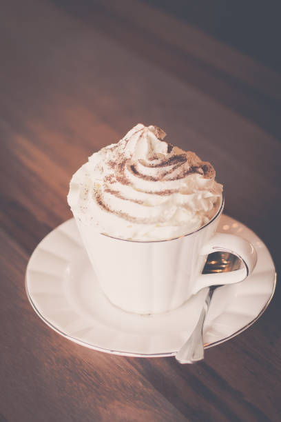 istock Vienna Coffee in white china coffee cup and tea spoon 1057185458