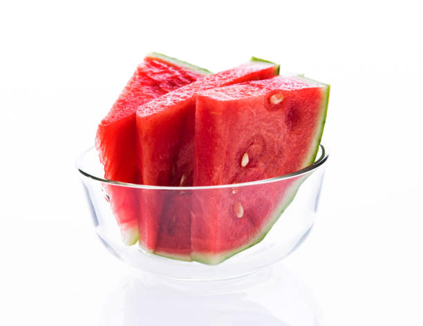istock A bowl watermelon slices on white background 1057189728