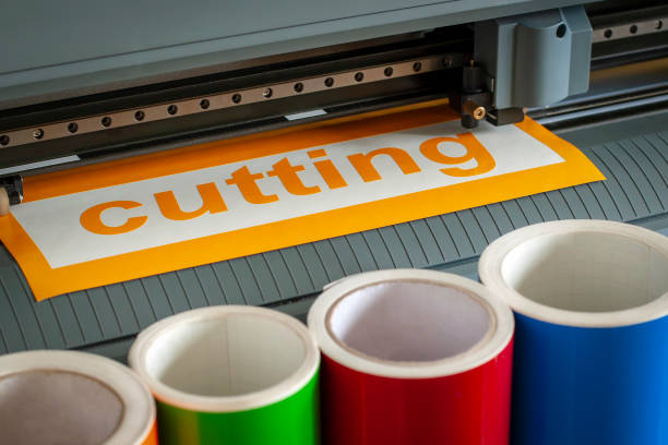 istock Cutting plotter close-up. The process of cutting a vinyl film. 1057193456