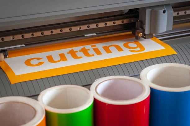 istock Cutting plotter close-up. The process of cutting a vinyl film. 1057193740