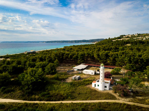 posidi lighthouse in kassandra peninsula at chalkidiki greece - greece blue forest national landmark imagens e fotografias de stock