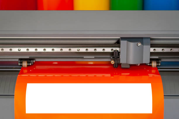 istock Cutting plotter close-up. The process of cutting a vinyl film. 1057197828
