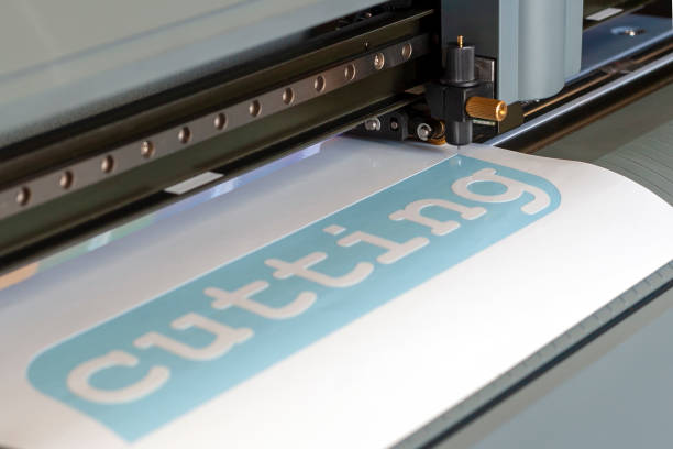istock Cutting plotter close-up. The process of cutting a vinyl film. 1057198250