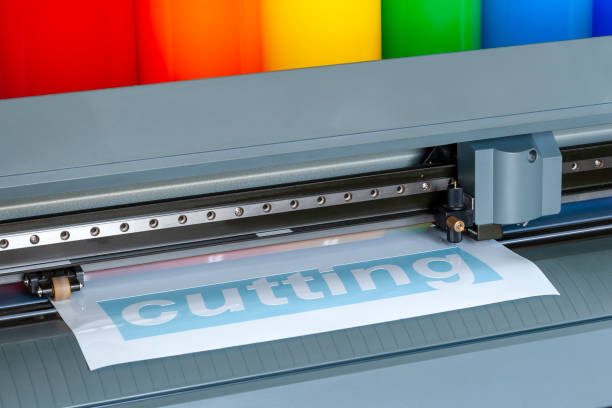 istock Cutting plotter close-up. The process of cutting a vinyl film. 1057198346