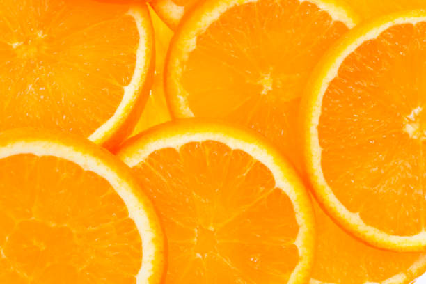 istock Close up of orange slices background 1057198396