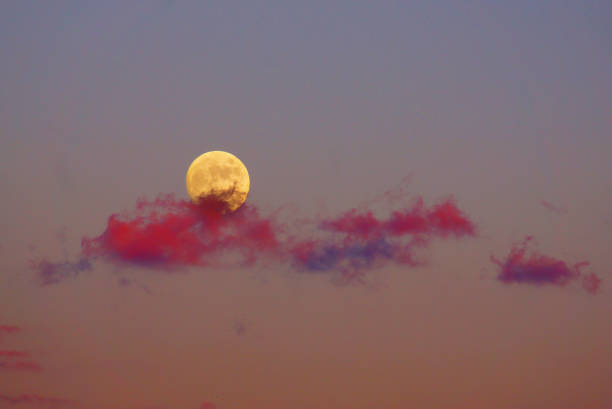 Month to be illuminated in the sunset