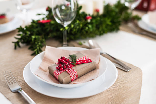 istock A table set for a dinner at home at Christmas time. 1057205410