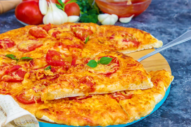 istock homemade pizza. selective focus. food and drink. 1057212596