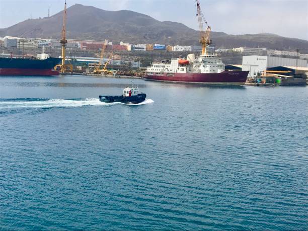 istock pilot ship sails in the port 1057217784
