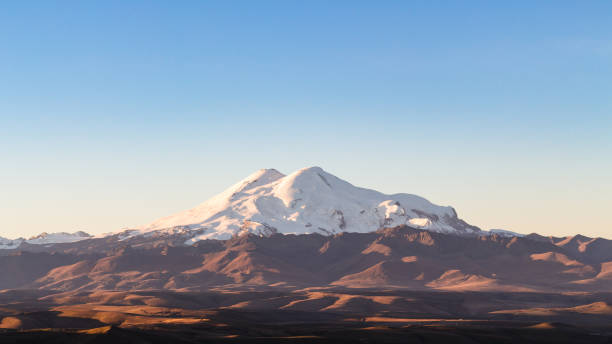 istock Mount Elbrus from Bermamyt Plateau at sunrise 1057220374