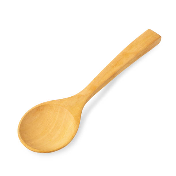istock Wooden spoon isolated on a white background 1057225286
