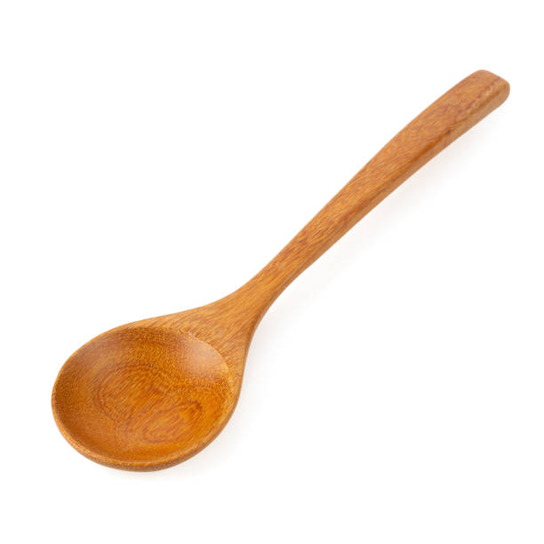 istock Wooden spoon isolated on a white background 1057225440