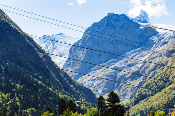 istock mountains around Dombay resort village 1057228938