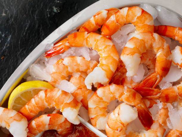 istock Shrimp on Ice with Cocktail Sauce 1057240774