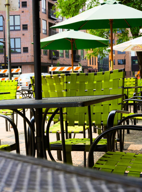 istock Green chairs set on an outside cafe 1057256228