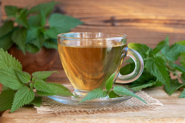 istock A cup of nettle tea with fresh nettles 1057259132