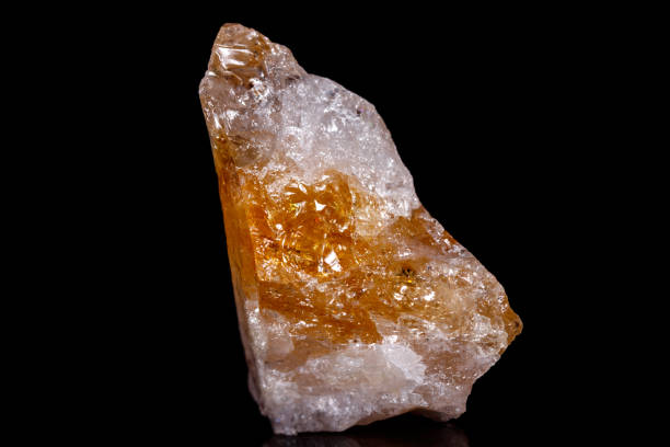 istock Macro mineral stone Citrine on black background 1057265052