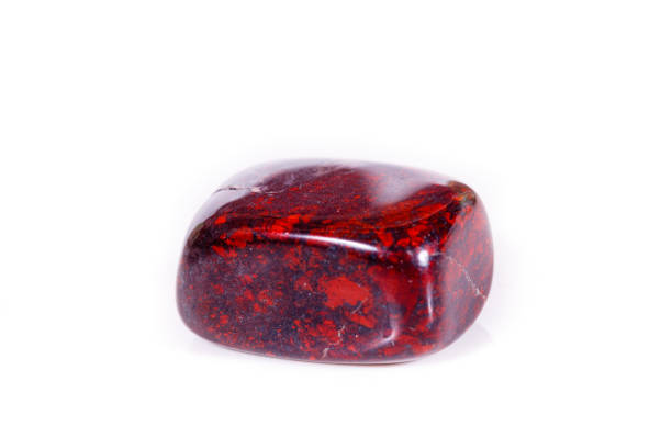 istock Macro mineral stone jasper hematite on white background 1057265226