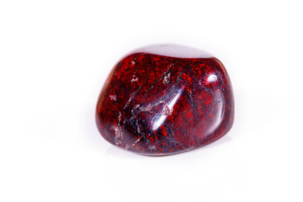 istock Macro mineral stone jasper hematite on white background 1057267502
