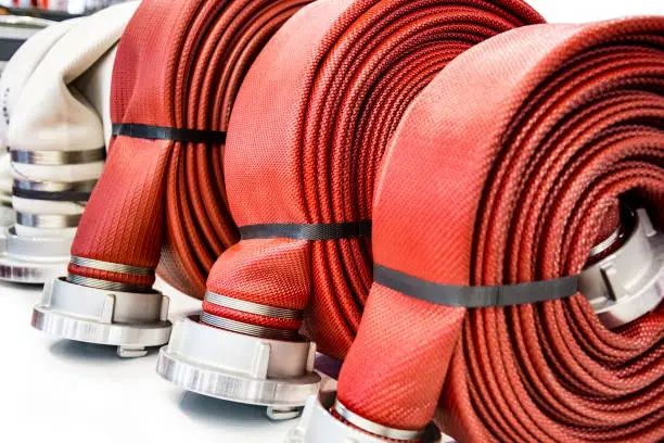 Close up of rolled-up fire hoses