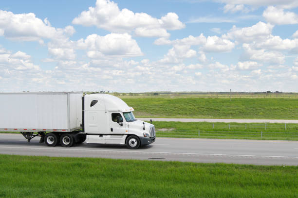 istock White Refrigerated Semi-Truck 1057272386