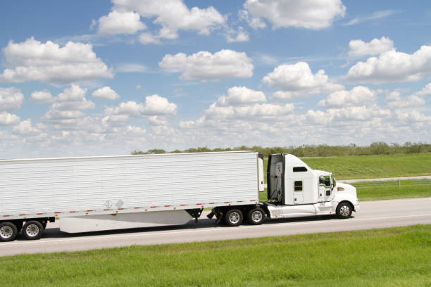 istock White Refrigerated Semi-Truck 1057273514