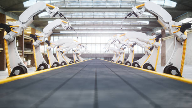 Welding Robots And Conveyor Belt In Automated Factory Interior of a modern automated factory with robotic arms and conveyor belt. robotic arm stock pictures, royalty-free photos & images