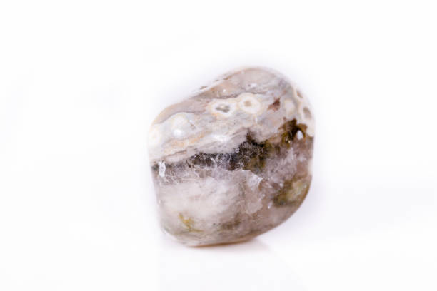 istock Macro mineral stone Jasper oceanic on a white background 1057280104