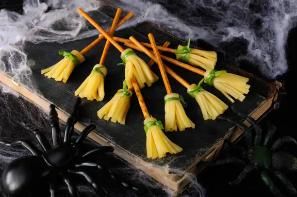 Witch broom made of cheese and bread straw. The original idea of serving snacks
