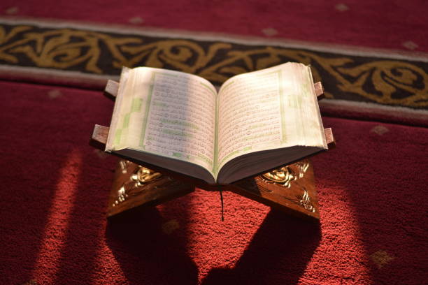 istock Reading a holy Al Quran 1057280720