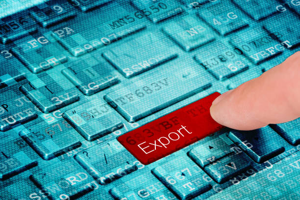 istock A finger press red Export button on blue digital laptop keyboard 1057288806