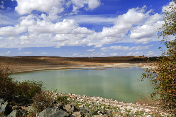 istock climate change and declining water dams and lakes, 1057289668