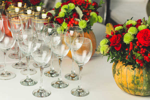 istock wine glasses on the table for drinks (close-up partial view). Festive crystal 1057291710