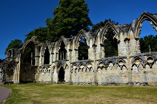 A view of the ruins of a medieval abbey in the gardens at York Museum