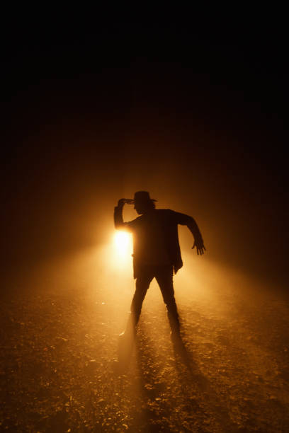 istock the man in front of light 1057295040